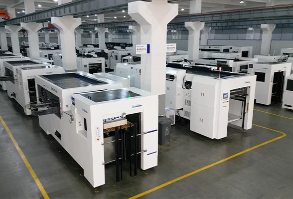 Mass production line of fully automatic die-cutting machines in a clean, modern factory workshop