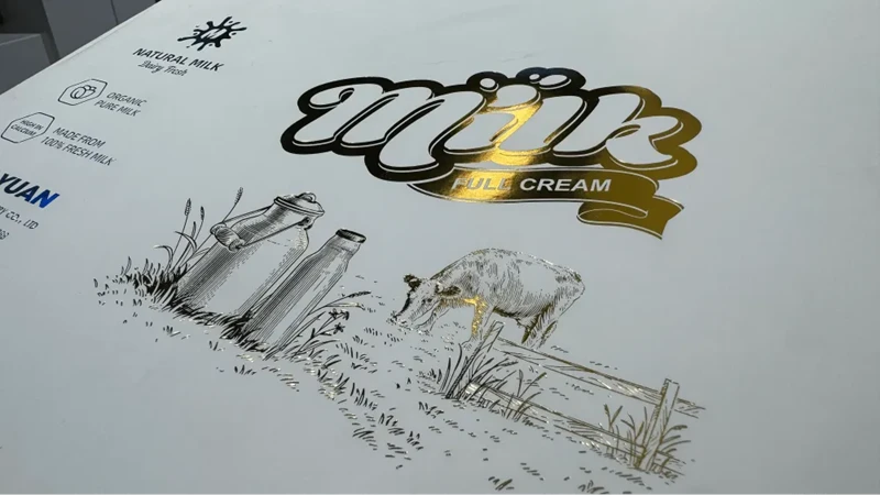 Gold foil stamping milk packaging sample by Dayuan Machinery